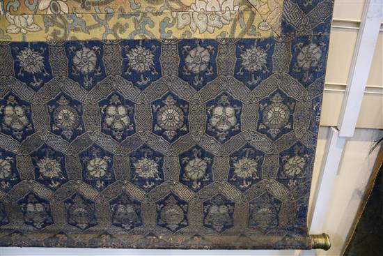 A thangka depicting Padmasambhava in the form of Nyima Ozer, Tibet, 19th century Total dimensions 133cm x 86cm